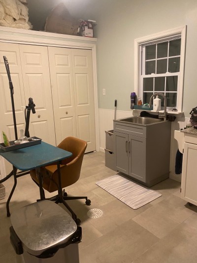 A separate grooming and laundry area helps us keep the Poms clean as well as their surroundings!