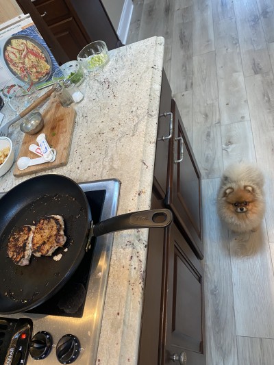 The adults get to take turns helping cook dinner!